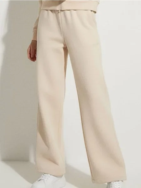 Широкі спортивні штани нюдовий