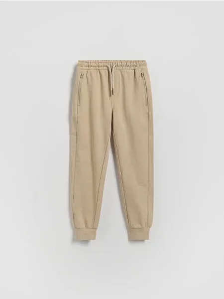 Reserved Pantaloni jogger din bej
