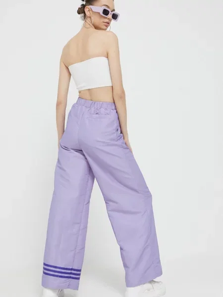 Kalhoty adidas Originals s aplikací fialová