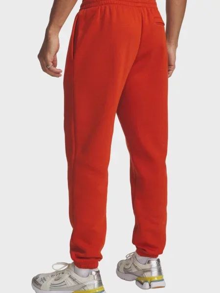Флисовые джоггеры Under Armour оранжевые