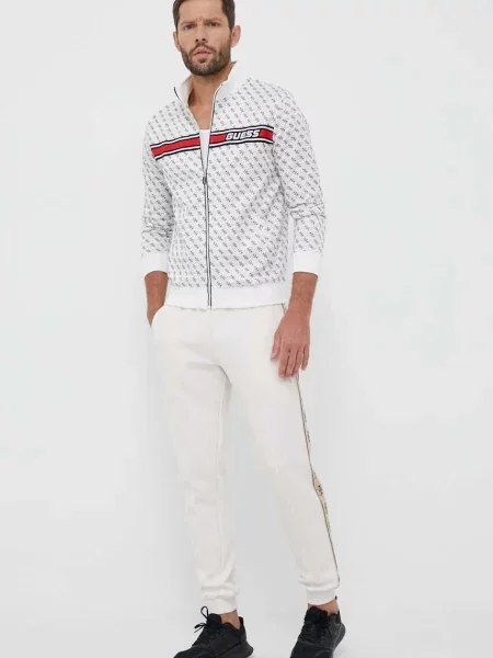 Спортивні штани Guess з принтом бежевий