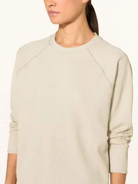 Sweter Odlo beżowy