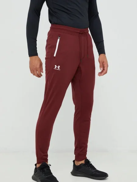 Kalhoty Under Armour hnědá hladké šedé