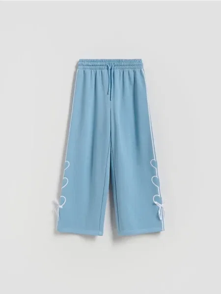 Reserved Трикотажні штани з бантиками світло-бірюзовий бірюзовий