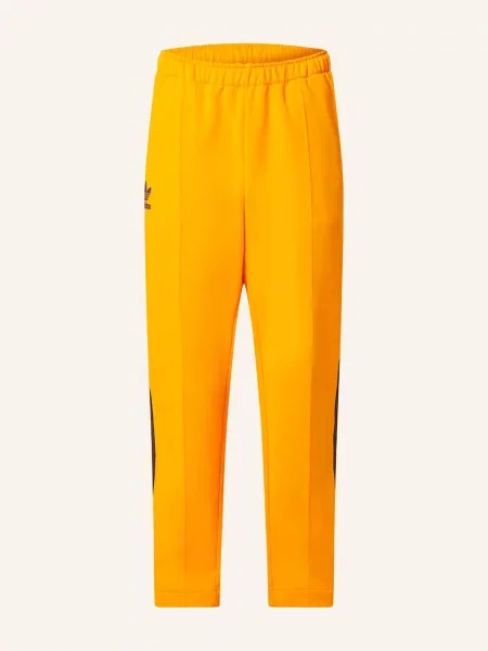 Spodnie dresowe Adidas z logo żółte