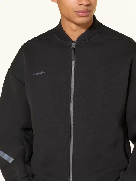 Dzianinowy komplet dresowy Adidas czarny