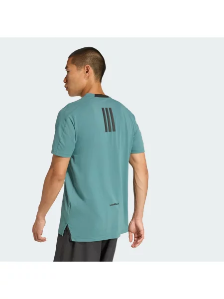 Koszulka Les Mills Graphic cyraneczka