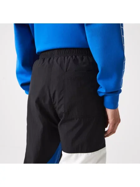 Lacoste Patchworkowe Wodoodporne Spodnie Dresowe granatowe
