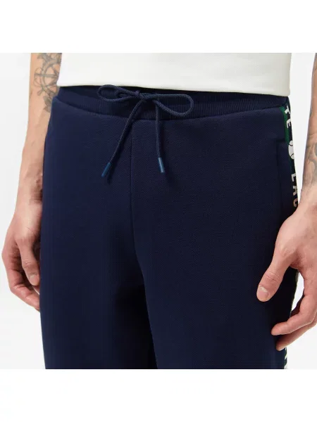 Lacoste Spodnie Dresowe Z Nadrukiem Regular Fit granatowe