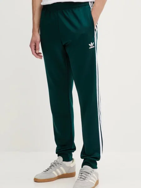 Спортивні штани adidas Originals Sst Tp з аплікацією зелений