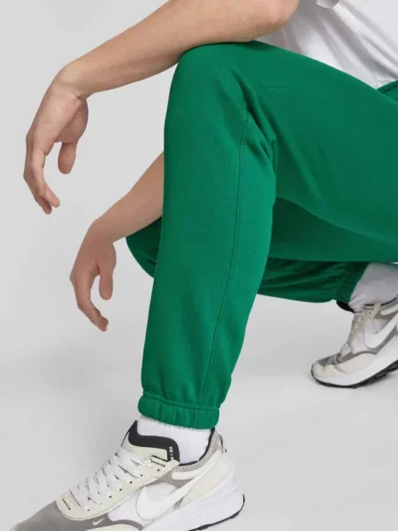 Spodnie dresowe z nadrukiem z logo Nike zielony