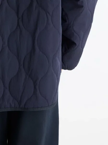 Стьобаний бомбер New Balance синій