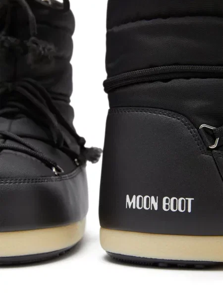 Raštuotos auliniai batai Moon Boot juoda