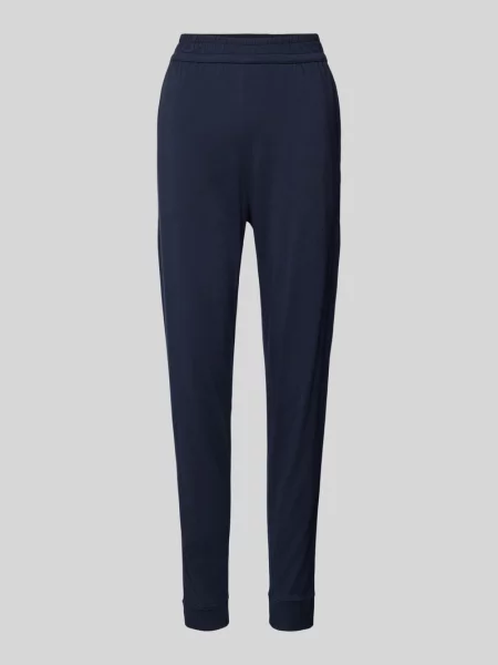 Spodnie dresowe o kroju relaxed fit ze szwami działowymi Schiesser granatowe