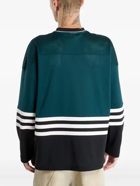 Pantaloni palazzo Adidas cu dungi cu decolteu în V negru