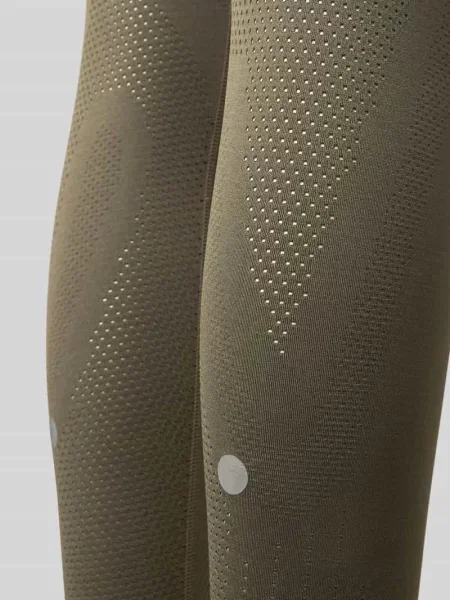 Legginsy Slim krój slim fit z nadruk z logo Asics oliwkowe