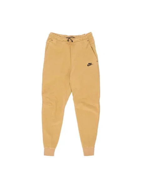 Joggery Nike polarowe beżowe