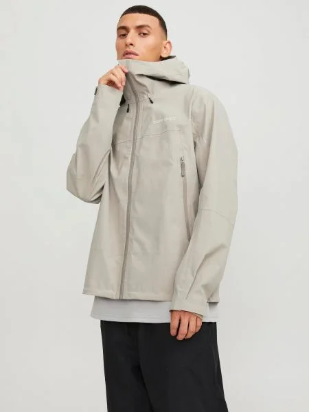 JACK & JONES Prechodná bunda TRAIL sivobéžová / biela