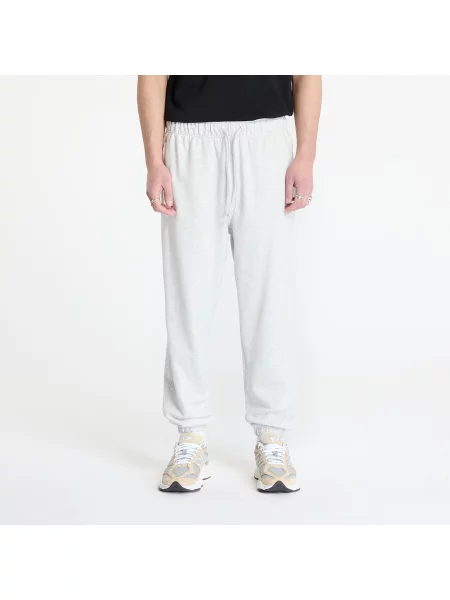 Froté kalhoty jogger New Balance šedé