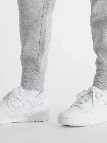 Флисовые джоггеры New Balance серые