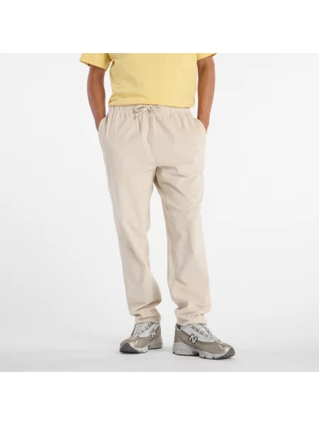 Spodnie New Balance – beżowe