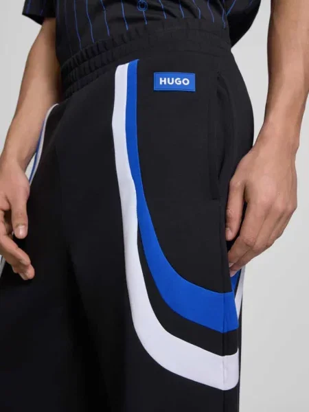 Spodnie dresowe o kroju relaxed fit z mieszanki bawełny model NALOTRON' Hugo Blue czarny