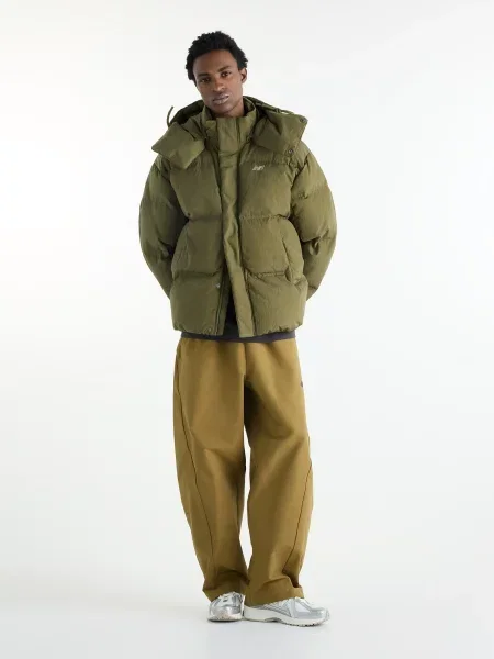 Пуховик New Balance зеленый