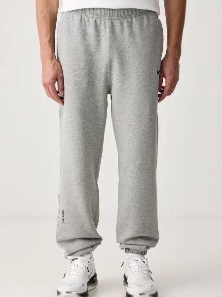 Nike Sportswear NOCTA spodnie dresowe z bawełną