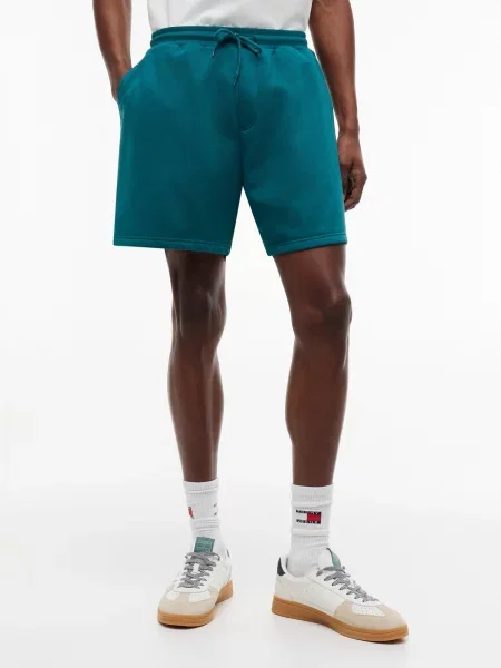 Tommy Jeans Pantaloni petrol verde
