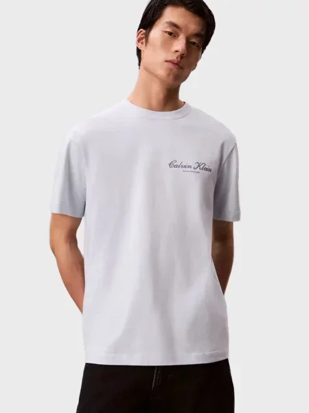 Графічний футболка Calvin Klein Jeans блакитна