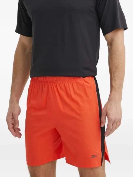 Pantaloni scurți Reebok cu imagine portocaliu