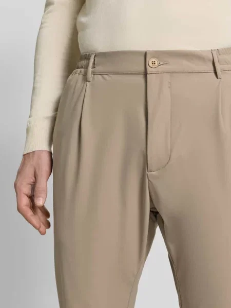 Spodnie w kroju slim fit z z lamówką na pośladkach Cruna beżowe