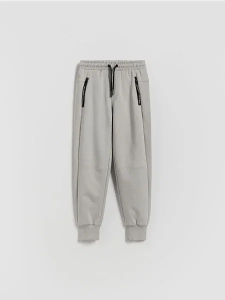 Reserved Pantaloni jogger din deschis gri