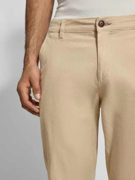 Spodnie o kroju slim fit ze szlufkami na pasek model ‘MARCO’ Jack & Jones beżowe