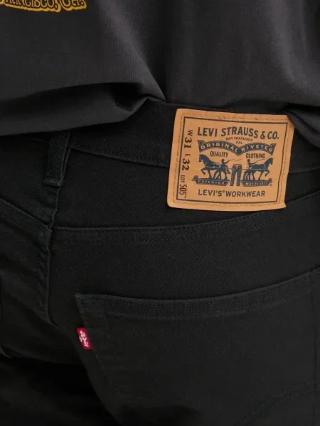 Blugi evazați Levi's® din piele de căprioară albastru