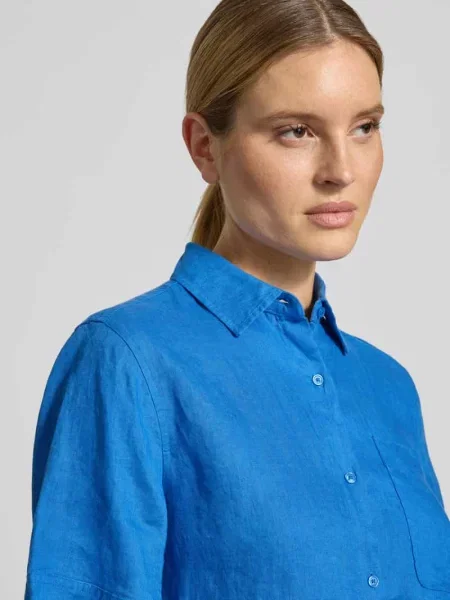 Bluzka lniana o kroju loose fit z brustaszą Tommy Hilfiger niebieska