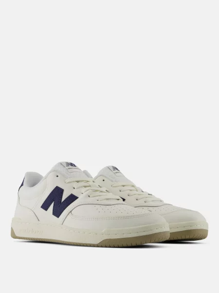 Кожаные кроссовки New Balance белые