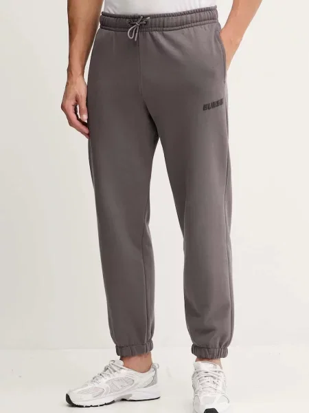 Спортивні штани Guess EMIS з принтом чорний