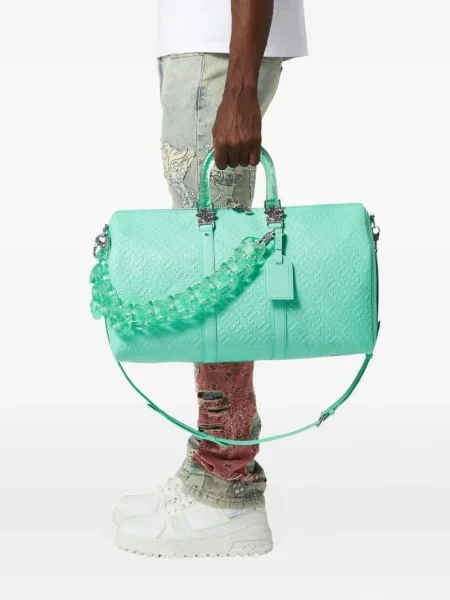 Kožený kufr Guapi na ramínka modrý