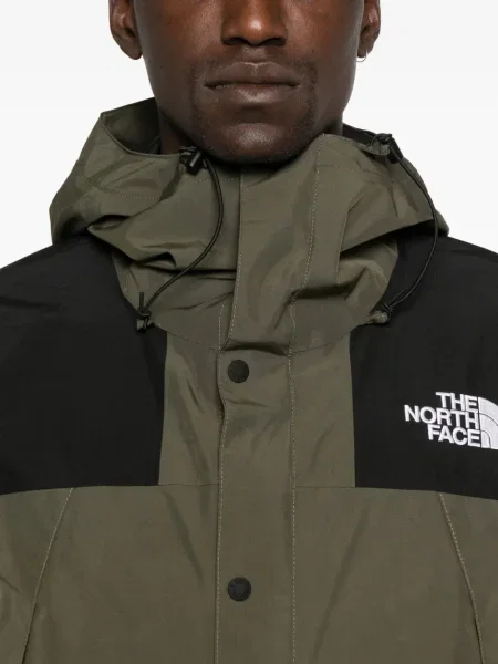 Geacă The North Face cu glugă verde