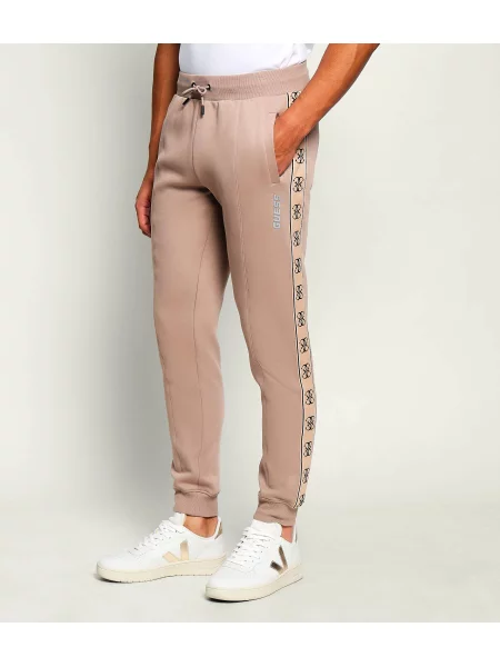 GUESS ACTIVE Pantaloni de trening Mickey bej