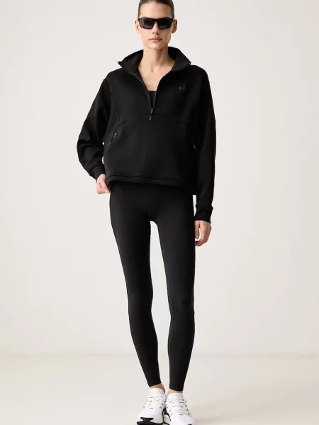 Under Armour pulover z bombažem Unstoppable črna
