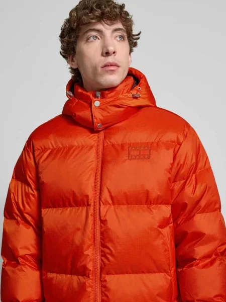 Kurtka puchowa o kroju regular fit model ‘ALASKA’ Tommy Jeans pomarańczowa