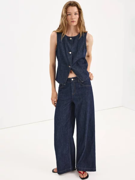 Jeansy wide leg z efektem sprania Kobieta 50 MANGO niebieski