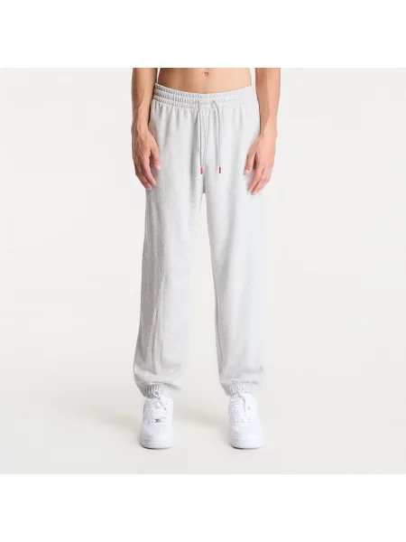Tepláky Jordan Brooklyn Fleece Pants Neutral Grey/ Htr/ University Red M šedé