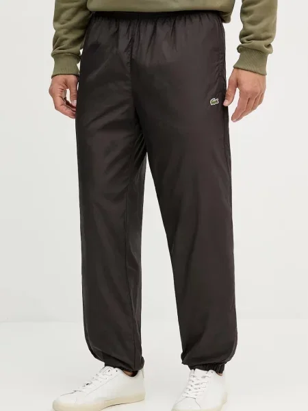 Спортивні штани Lacoste однотонні коричневий