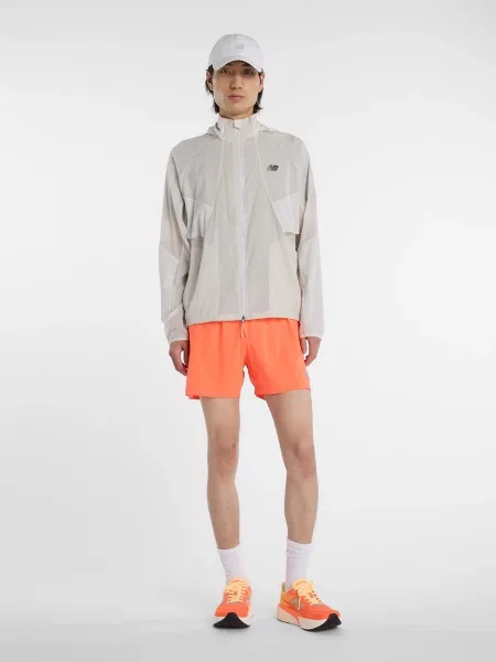 Спортивные шорты New Balance оранжевые
