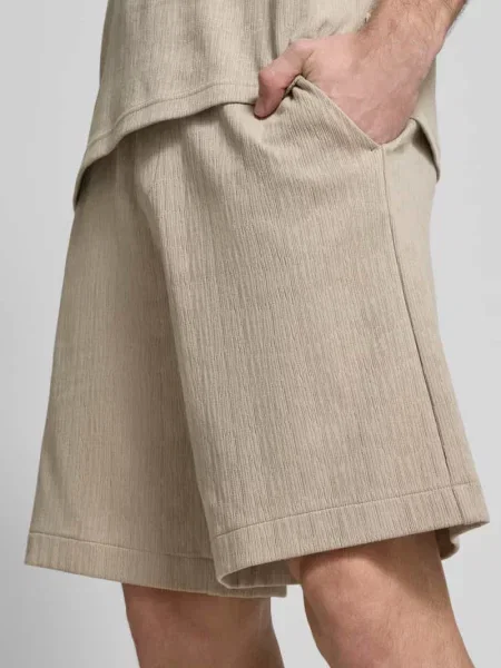 Szorty z dzianiny dresowej o kroju regular fit z detalem z logo Ck Calvin Klein beżowe