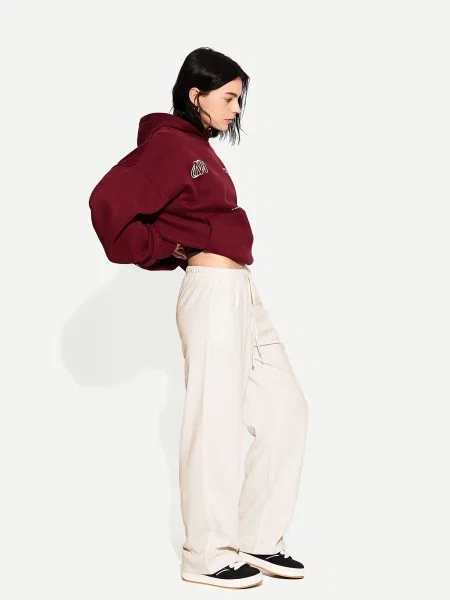 Bershka Nohavice pastelovo žltá
