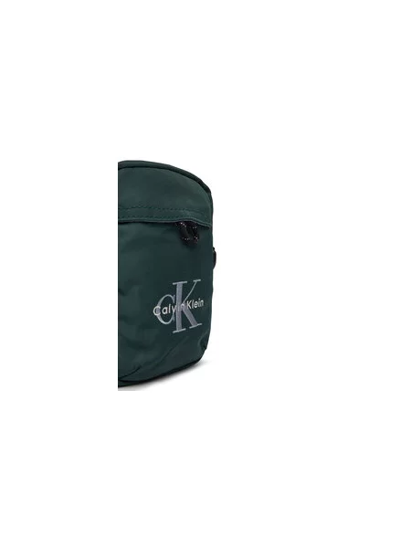 Torbica za okrog pasu Calvin Klein Bold Logo Nylon Slim Reporter zelena